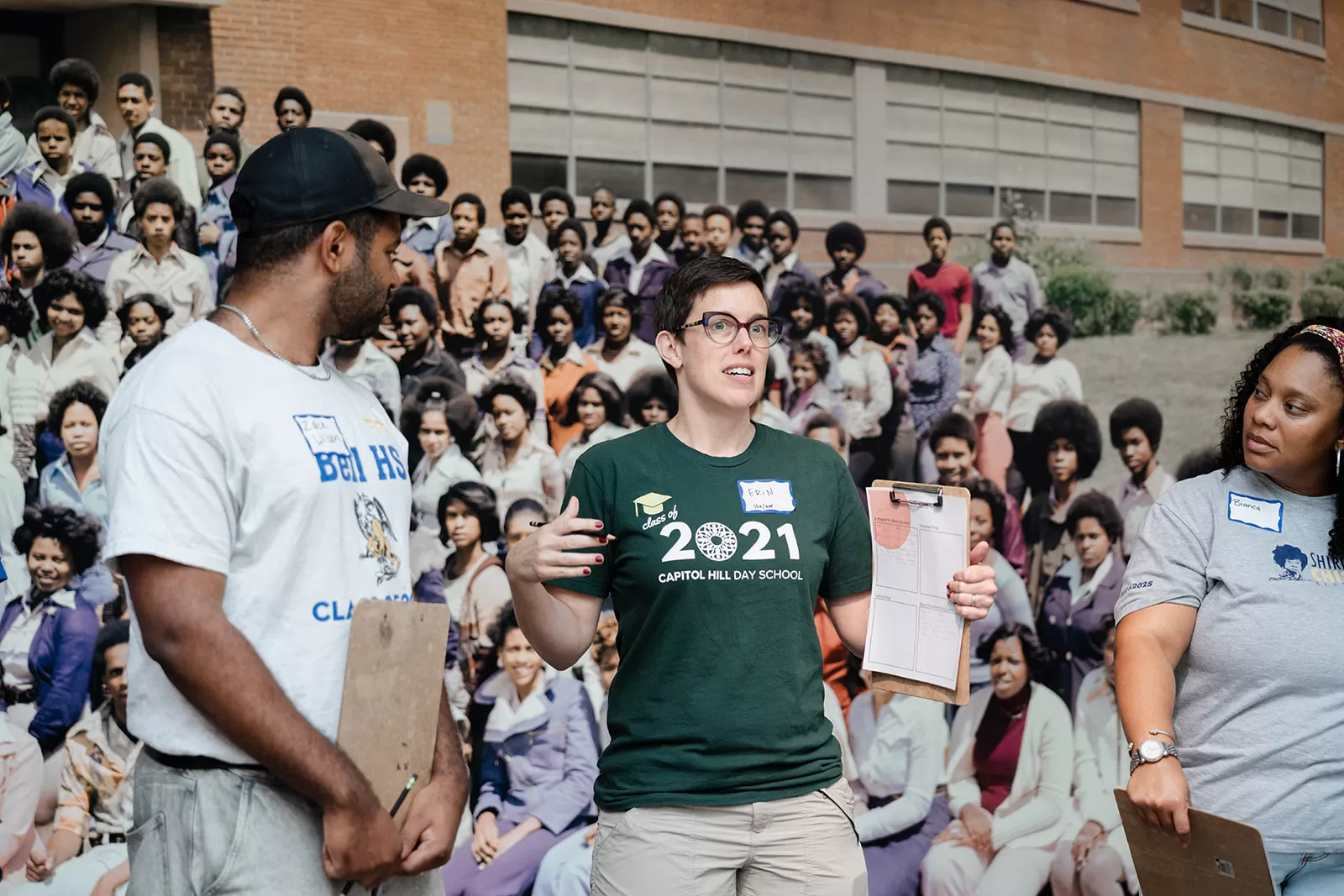 Teachers discuss the content of the "Class Action" exhibit with one another.