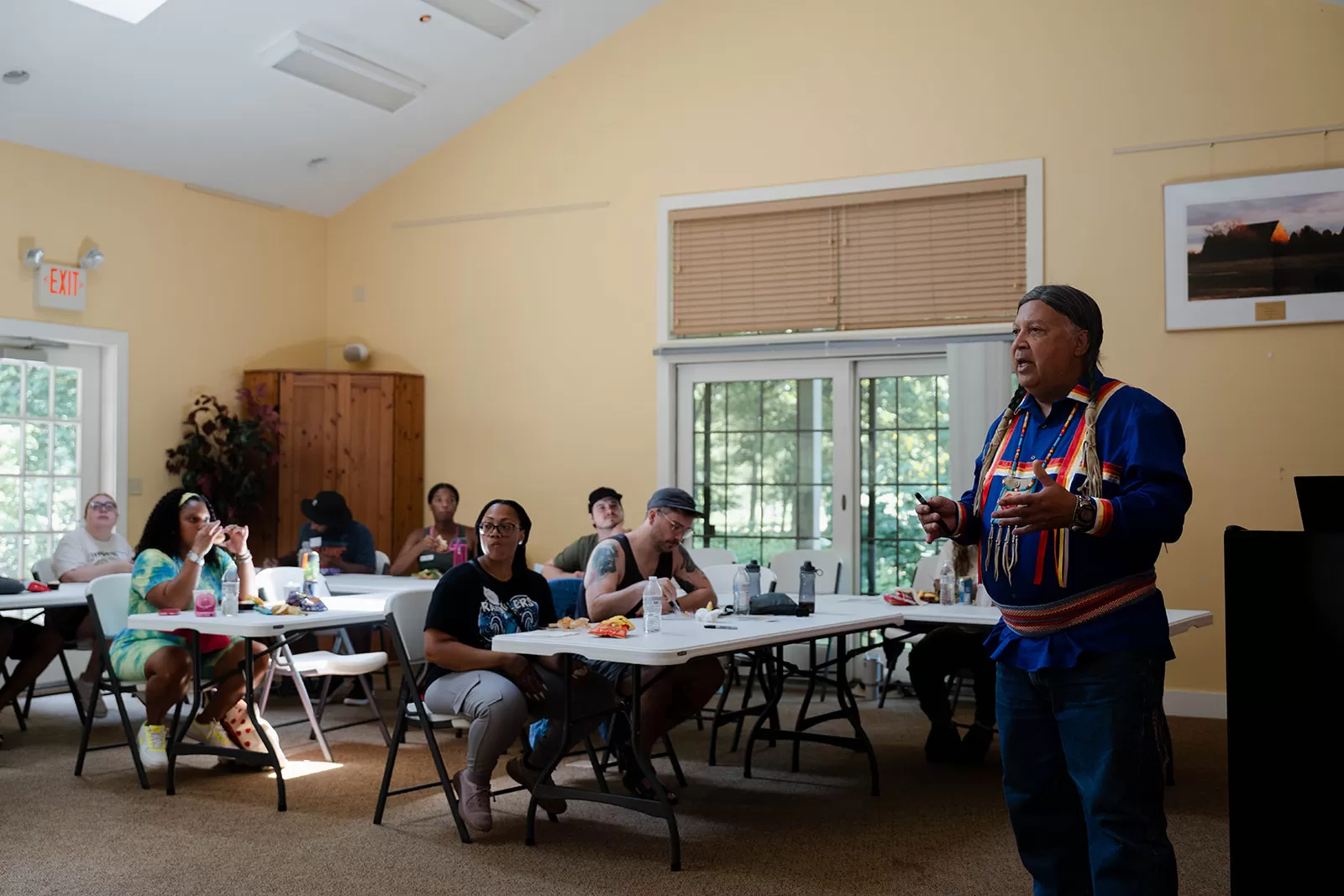 Teachers and DC History Center staff listen to a presentation by tribal historian Mario Harley.